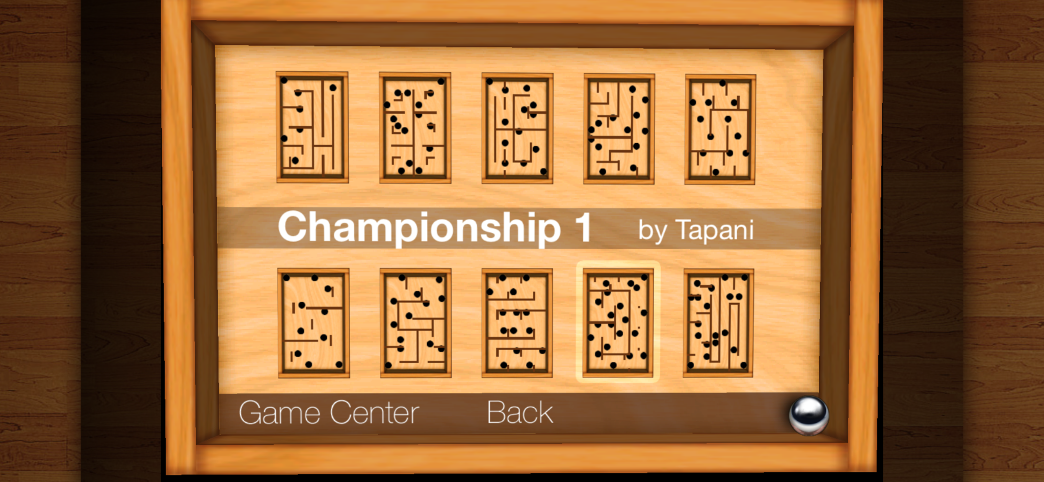 Level selection screen with multiple wooden labyrinth boards